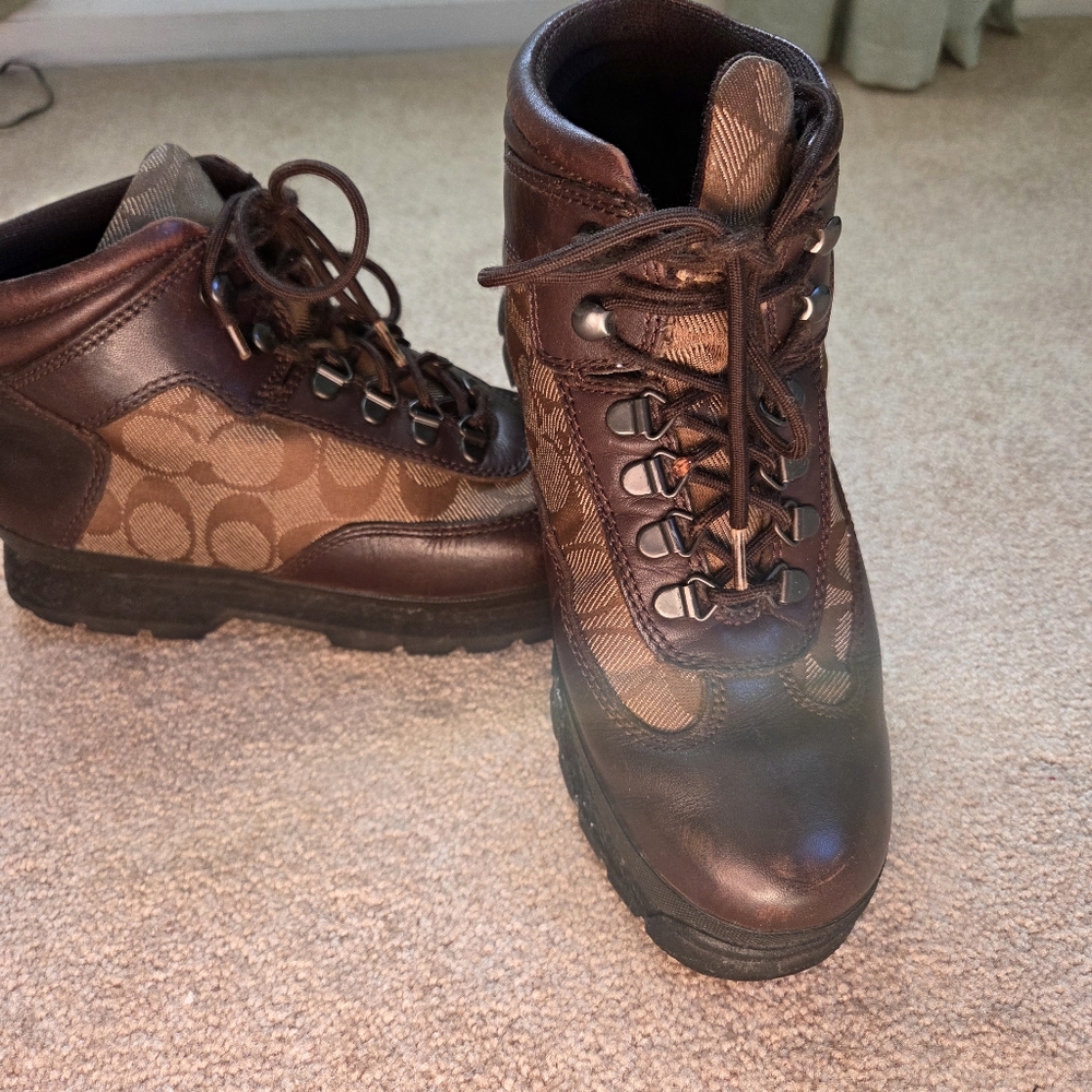 Coach ankle brown with monogram design booties.